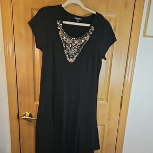 Chic Black Mini Dress with Embellished Neckline